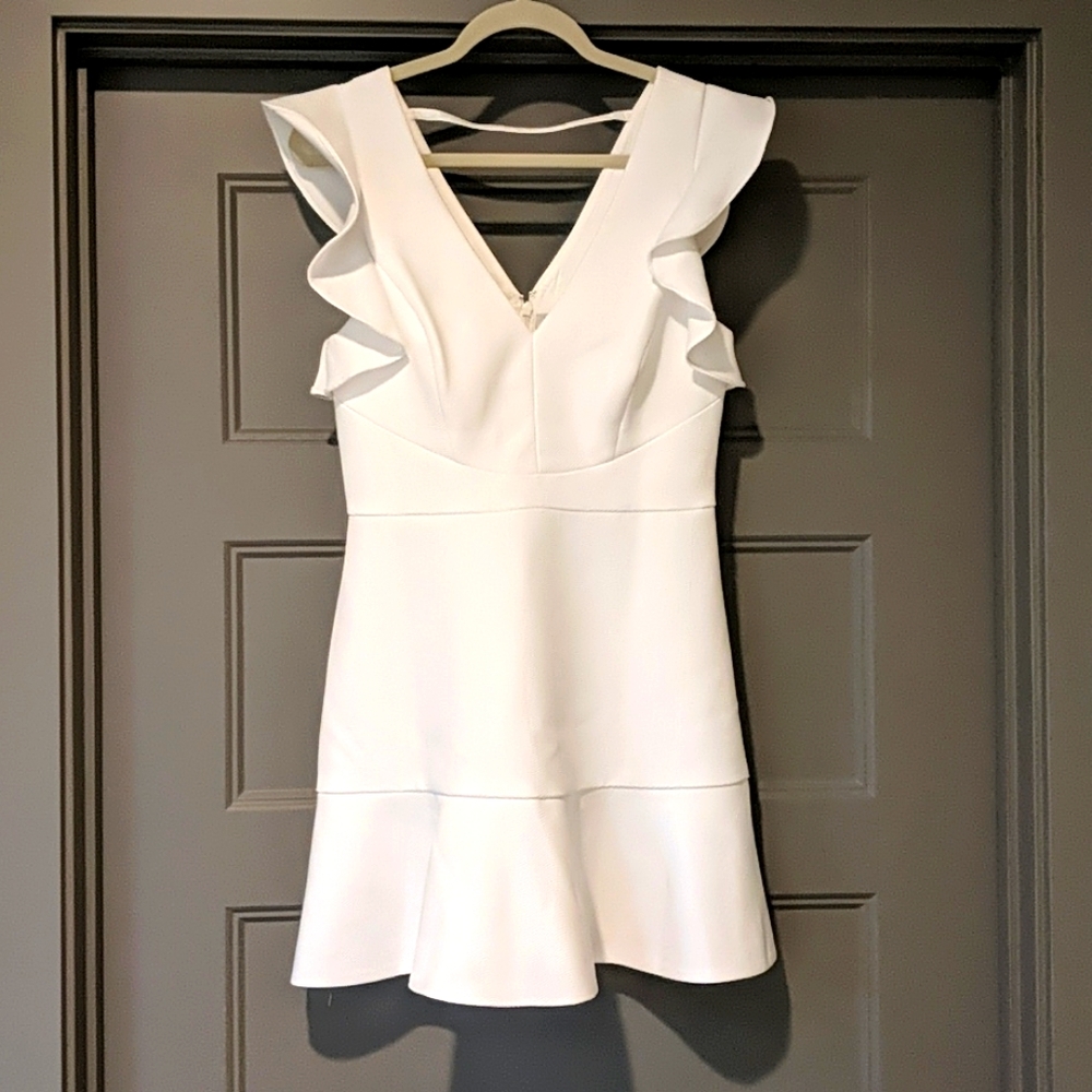 White ruffle mini dress